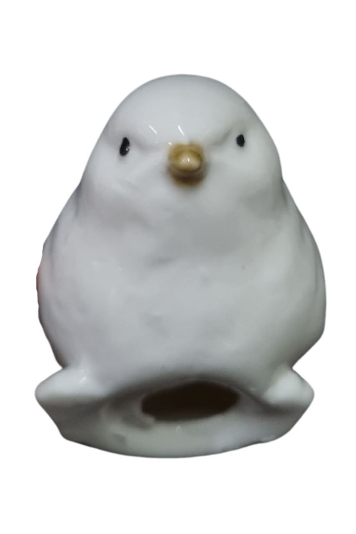 Passarinho branco ciscando porcelana cx. c 9 2